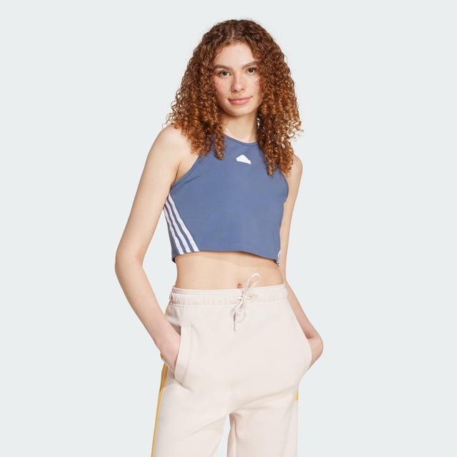 Embrace the future in this iconic design. This adidas tank top is great for both sport and leisure with its soft, stretchy fabric and distinctive 3-Stripes. Slip into this top and stay comfortable whether you're travelling or taking it easy. The cotton in this product has been sourced through Better Cotton. Better Cotton is sourced via a chain of custody model called mass balance. This means that Better Cotton is not physically traceable to end products.Find out more here: https://bettercotton.org/who-adidas-are/our-logo/  - Slim fit - Round neck - 90% cotton, 10% elastane - 3-Stripes wrapping tape - adidas Badge of Sport - Sourced through Better Cotton via a system of mass balance and therefore this product may not contain Better Cotton  Shipped by adidas