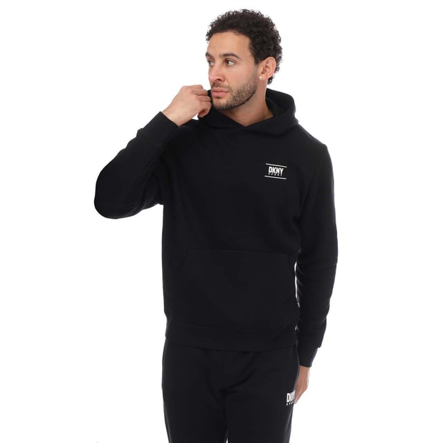 Mens DKNY Printed Logo Blackwater Hoodie in black.- Adjustable drawstring hood.- Kangaroo pocket.- Ribbed cuffs and hem.- Loose fit.- 72% Cotton  28% Polyester.- Ref: DKS0122BLK