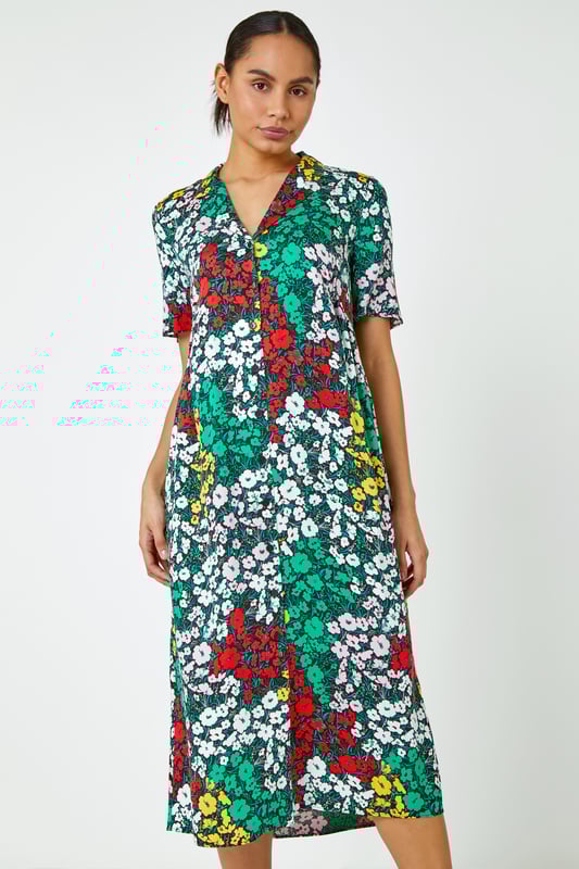 Ditsy Floral Midi Shirt Dress from Roman. We just can't get over this floral print woven dress, cut to a timeless silhouette its relaxed collared neckline and colourful hues give it a feminine and sophisticated feel. Made from a lightweight fabric, button down front with short sleeves, this style is perfect for summer and can be worn with a cropped denim jacket and sandals for the ultimate post-lockdown look.