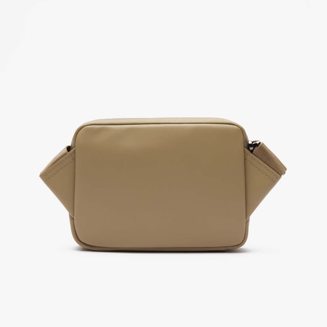 Leather Monogram Print Vertical Satchel.- Dimensions: L5.9 x H8.3 x D2 in.- L15 x H21 x D5 cm.- Exterior in split calfskin leather.- Adjustable strap: 75cm - 140cm - 29.5 - 55 in.- 1 zipped pocket on outside, 1 mesh patch pocket on inside.- Enamel plaque with crocodile logo. Material: 100% Polyurethane. Ref: NH4486MRC87.