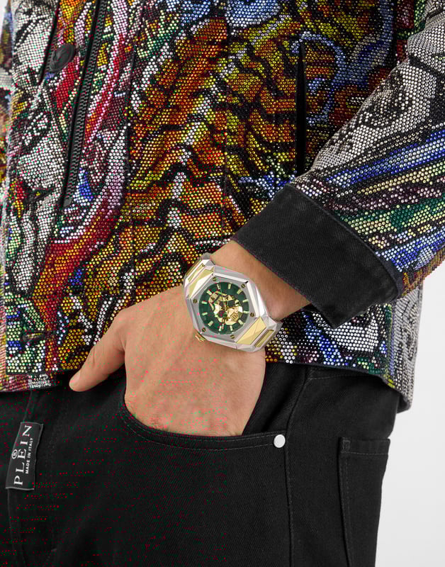 This Philipp Plein The $kull Spikes Analogue Watch for Men is the perfect timepiece to wear or to gift. It's Silver 45 mm Round case combined with the comfortable Multicolour Stainless steel watch band will ensure you enjoy this stunning timepiece without any compromise. Operated by a high quality Quartz movement and water resistant to 5 bars, your watch will keep ticking. A new legendary watch is born and it’s ready to shock the world.   The Philipp Plein $kull Spikes is the icing on the cake of your collector status in the exclusive Philipp Plein universe. This Analogue watch has a  function: Luminous Hands and Luminous Numbers High quality 21 cm length and 24 mm width Multicolour Stainless steel strap with a Deployment clasp Case diameter: 45 mm,case thickness: 12 mm, case colour: Silver and dial colour: Green
