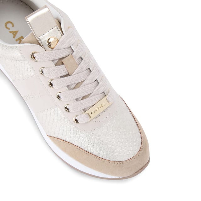 This Carvela Frame Runner trainer is crafted in gold with a flat lace up front. There are gold Icon C branding features across the trainer. The sole in pumped in white.