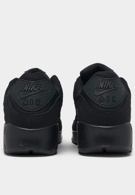 Step up your sneaker game when you step out in the classic Men's Nike Air Max 90 Casual Shoes. Low top silhouette with padded collar and tongue for comfort. - - . Retro runner turned lifestyle sneaker design. - - . Textile upper with synthetic and leather overlays. - - . Nike Max Air unit in heel for support and cushioning. - - . Flexible sole design encourages a more natural stride. - - . Rubber outsole with waffle traction pattern. - - . The Nike Air Max 90 is imported.