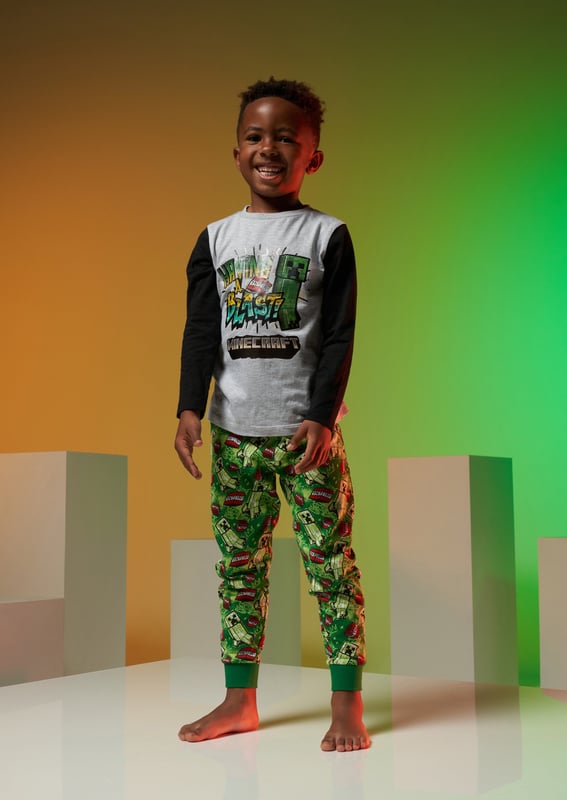 These supersoft Minecraft branded PJs with our A&R twist are a collab dream and perfect for 'having a blast' at sleepovers! About me: Top: 93% Cotton/7% Polyester. Bottoms: 100% Cotton Angel & rocket cares - made with fairtrade cotton Look after me: think planet. machine wash at 30c.