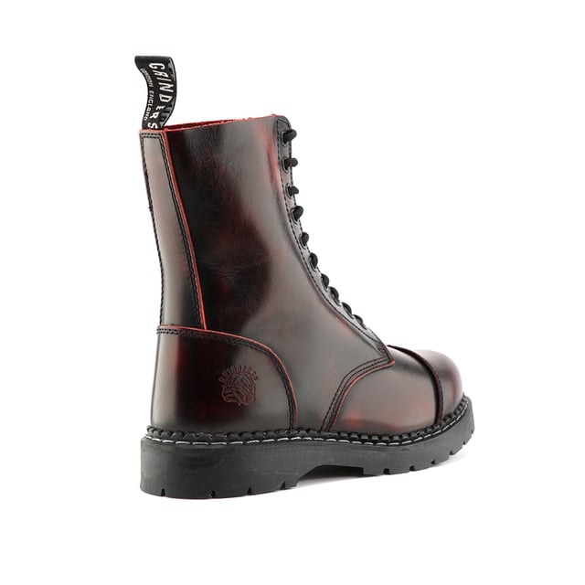 The Stag ACS, a celebrated staple of Grinders' original lineup, has maintained its status as a best seller with its 2015 update. This updated model features a 10-eyelet lace system for a secure fit and is reinforced with a steel toe cap certified to EN ISO 20345:2011 SB standards for enhanced safety. The boot's padded insole provides added comfort, while its durability is assured by a chunky, oil-resistant rubber sole that is Goodyear welted for long-lasting wear. Additionally, the Stag incorporates Grinders' Air Cushioned Soles (ACS) for superior comfort. A branded pull loop at the boot's opening ensures ease of wear and removal. 10 Eyelet Derby Boot, Steel Toe (Certified EN ISO 20345:2011 SB), Goodyear Welted, Grinders’ Air Cushioned Soles (ACS), Leather Uppers