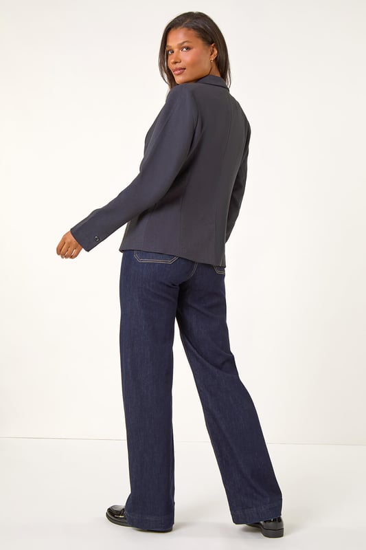 Tailored Single Breasted Blazer from Roman. Be the classiest on your next occasion with our tailored single-breasted jacket. Designed with a smart collar and rever front opening, this long-sleeve jacket features functional front flap pockets and a button fastening for a timeless look. Fully lined for warmth and tailored for a flattering silhouette. Pair with wide-leg trousers and heels for a sophisticated look!