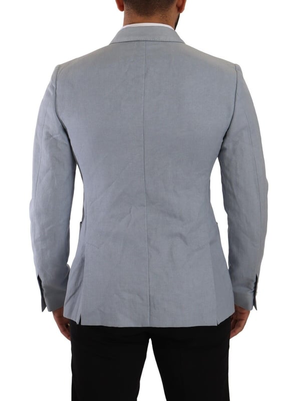 Brand: Dolce & Gabbana
  Style: Double breasted
  Fitting: Slim fit
  Colour: Light Blue
  Made in Italy
  Material: 60% Cotton 40% Flax
  Lining: 100% Viscose
  Logo details
  Very exclusive and high craftsmanship
Material: 60% Cotton 40% Flax