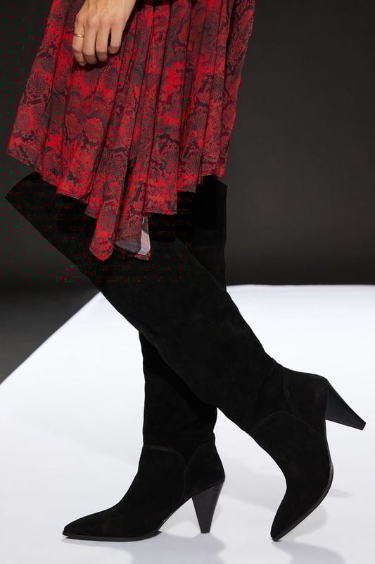 Luxurious suede over-the-knee boots
        Sleek pointed toe design
        Striking conical heel between 7 and 9cm
        Versatile day-to-night style
        Smooth, form-fitting silhouette
    
    Step into sophistication with these stunning over-the-knee boots from RUNWAY 1.8.1.8. The sumptuous suede texture and sleek silhouette create a look that's both elegant and edgy. Perfect for transitioning from day to night, these boots offer versatility in spades. Pair them with a flowing maxi dress for a romantic evening ensemble, or style with skinny jeans and an oversized jumper for a chic daytime look. The conical heel adds just the right amount of height without sacrificing comfort, making these boots ideal for long days at the office or nights out on the town. Whether you're dressing up or down, these boots will add a touch of glamour to any outfit, ensuring you stand out from the crowd with effortless style.