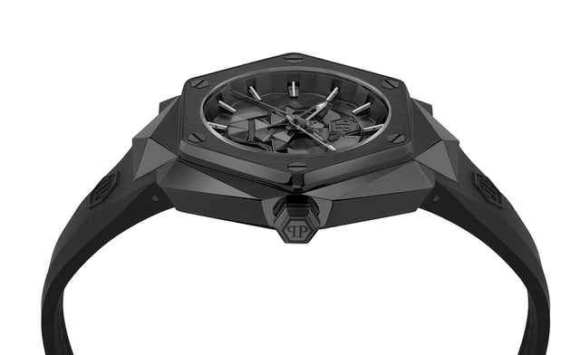 This Philipp Plein The $kull Spikes Analogue Watch for Men is the perfect timepiece to wear or to gift. It's Black 45 mm Round case combined with the comfortable Black Silicone watch band will ensure you enjoy this stunning timepiece without any compromise. Operated by a high quality Quartz movement and water resistant to 5 bars, your watch will keep ticking. A new legendary watch is born and it’s ready to shock the world. The Philipp Plein $kull Spikes is the icing on the cake of your collector status in the exclusive Philipp Plein universe. This Analogue watch has a function: Luminous Hands High quality 21 cm length and 24 mm width Black Silicone strap with a Buckle Case diameter: 45 mm,case thickness: 12 mm, case colour: Black and dial colour: Black