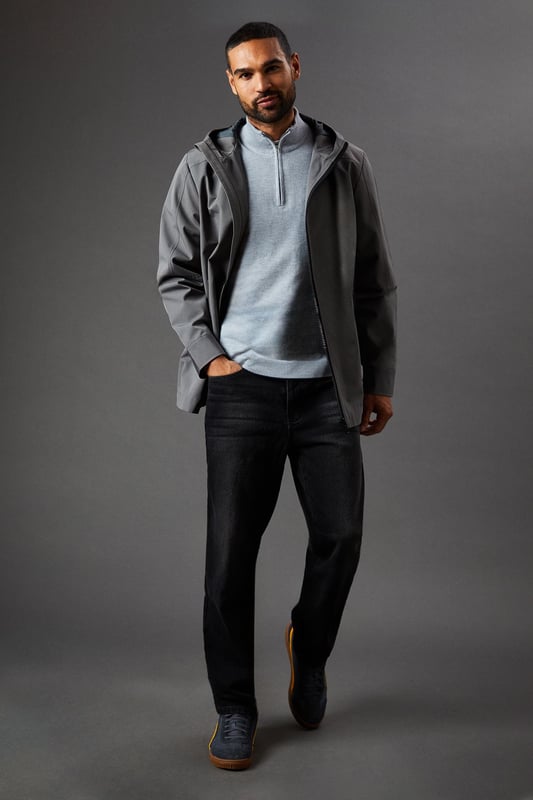 Water-resistant fabric for protection against light rain
        Adjustable hood for customisable coverage
        Full-length zip closure for easy wear
        Practical side pockets for essentials
        Versatile design suitable for various casual occasions
    
    This Burton water-resistant hooded jacket is the perfect companion for the unpredictable British weather. Its sleek design marries functionality with style, making it an ideal choice for the modern man who values both practicality and appearance. The jacket's clean lines and minimalist aesthetic allow for effortless pairing with a variety of outfits. For a smart-casual look, layer it over a light jumper with dark jeans and trainers, as shown in the image. It's equally at home for a weekend walk in the park, a casual day at the office, or meeting mates at the local pub. The adjustable hood and water-resistant fabric offer protection from unexpected showers, ensuring you stay dry and comfortable. Whether you're heading to a football match or running errands around town, this versatile jacket will keep you looking sharp and prepared for whatever the day may bring.