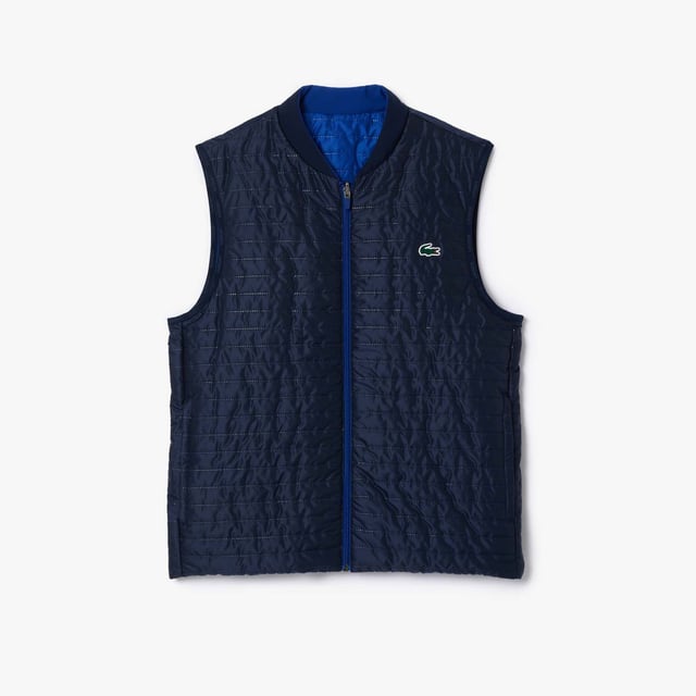 Designed for Tennis & Golf  for a regular frequency of use. This reversible padded sleeveless jacket is made with bonded quilting mixed with stretch taffetas on one side for an athletic silhouette and full bonded quilting for a more elegant look. This 3rd layer will keep you warm during your outdoor training. This product is providing you water repellent fabric which guarantees you to remain dry in bad weather conditions. Regular fit: natural ease on body It has been tested by professionals players to ensure functionality. The most adapted fashion sport apparel and accessories items to our Golf and Tennis athletes to prepare for and for game day.