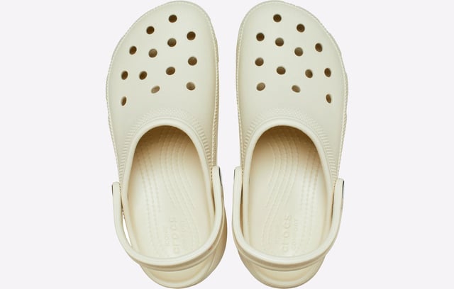 The Classic clog reimagined with an extra dose of height, attitude, and style.
- Pivoting back strap for a secure fit- Same Classic Clog upper- Customizable with Jibbitz charms on the upper and backstrap- Iconic Crocs Comfort: Lightweight.- Flexible. 360-degree comfort