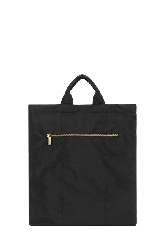 Made from our signature nylon, the Portrait Nylon Tote is the perfect way to carry all your everyday essentials. Featuring a padded carry handle and adjustable crossbody strap with a clip off function. Features: , Zip top opening, Front oversized flap over zip pocket, Rear zip pocket, SMITH & CANOVA antique brass logo, Branded antique brass zips, Padded grab handle, Adjustable crossbody strap (detachable), Internal 15 inch padded laptop sleeve, Internal zip pocket, 2 Internal mobile phone slip pockets - fits normal and plus size smart phones, 2 Internal pen slip pockets Style Ref: 92682 BLACK