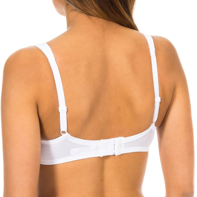 Soft-Cup-BH.
 Weiße Farbe mit Gitter Detail auf den Seiten Ton.
 Elastische, verstellbare Schultergurte.
 Hinterer Verschluss mit Drei-Wege-Bügeln.
 Elastische Seiten.
 Abgenähte Nähte.

 Zusammensetzung:
 - 76% Polyamid.
 - 24% Elasthan.

 Pflege:
 - Handwäsche.
 - Kein Bleichmittel verwenden.
 - Nicht im Trockner trocknen.
 - Nicht bügeln.
 - Nicht chemisch reinigen.