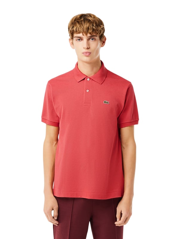 This comfortable and elegant L.12.12 polo impresses with its classic Lacoste design. A timelessly chic style for the modern wardrobe, ideal for any occasion. If you are between two sizes, we recommend the smaller size.
