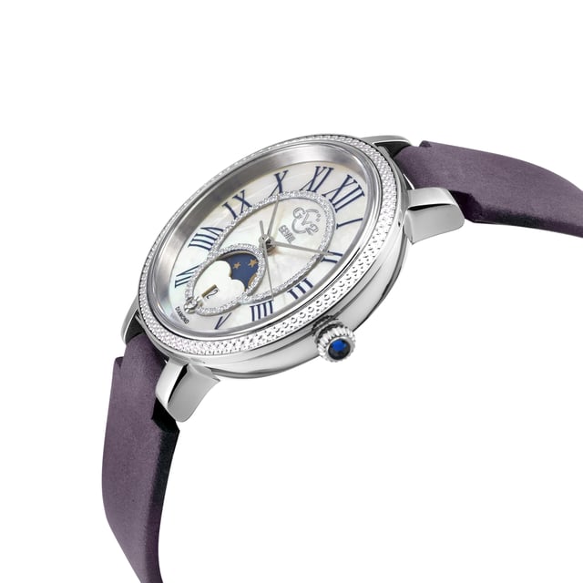 GV2 12540 Women's Genoa Watch

GV2 Women's Swiss Watch from the Genoa Collection
37mm 316L Stainless Steel Case, Diamond Cut bezel
White MOP Dial, Moon Phase -Date at 6.00
Push Pull crown with Blue Cabochon Stone
Genuine Italian Black Plum Suede Leather Strap with Tang Buckle
Anti-reflective Sapphire Crystal
Water Resistant to 50 Meters/5ATM
Swiss Quartz Movement Ronda Moon Phase 708