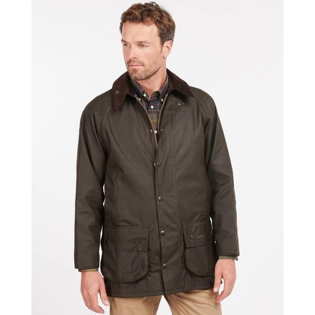 The Classic Beaufort is a stylish, practical men's waxed jacket with timeless country looks and a Sylkoil outer.
Quintessentially Barbour, this versatile jacket is tough enough to brave the great outdoors yet equally suited to city wear - it offers a relaxed fit perfect for throwing over a suit when commuting to work. Ideal for year-round use, it boasts a 100% cotton lining in Barbour's iconic tartan print, with an interactive zip designed for pairing with an optional quilted liner when extra insulation is needed.
The Classic Beaufort's smart corduroy collar feels luxuriously soft and is studded to take an optional hood, while the two-way zip, studded storm fly front and Velcro-fastening wind cuffs seal out draughts. Two lower bellow pockets offer plenty of room for essentials, and moleskin-lined handwarmer pockets provide welcome warmth on cold days. A useful rear game pocket completes the impressive line-up of functional features.

Mediumweight Barbour Sylkoil
Pure cotton Barbour Tartan lining
Corduroy collar
Two way zip
Two large bellow pockets
Two handwarmer pockets
Full width, lined, rear game pocket with side zips
Velcro fastening wind cuffs
Extra zip pocket underneath the storm flap
Studded storm fly
Length: 33-34ins | 84-86.5cm
Studded for optional hood
Interactive zip