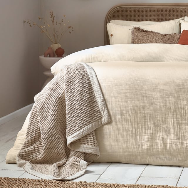 Inspired by timeless classic fabrics, the Lark duvet cover set is made from ultra-soft double-layer muslin cotton fabric. Available in a range of pastel tones, this bedding is complete with a wooden button closure. The cosy crinkle texture is perfect for bringing a relaxed, stylish feel to your bedroom. Cool and breathable in the summer months and snuggly and warm in the winter, muslin is used on both sides for an understated yet modern look. This product is certified by OEKO-TEX®, showing it has been sustainably made.