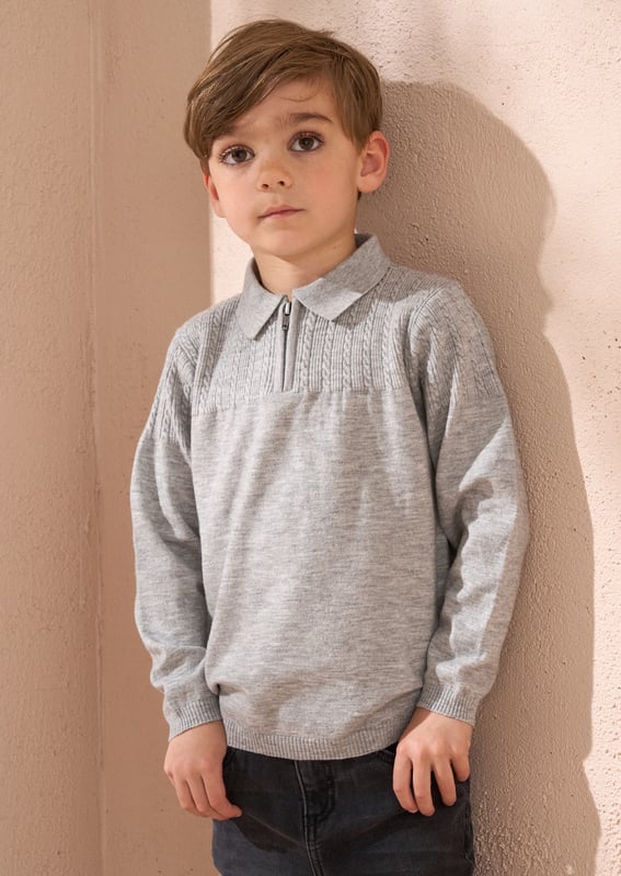 For the boy who knows his own style. This true knit long sleeve polo is a key trend for the season and is the perfect way to do smart in a new way. Super soft. button thru and sooo stylish.