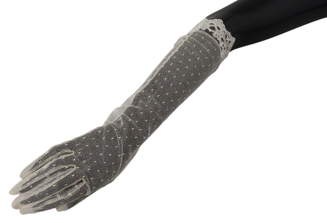 Gorgeous brand new Dolce & Gabbana elbow length gloves
  Made in Italy
  Logo details
  Crafted with high craftsmanship
  Material: 90% Cotton 7% Viscose 3% Nylon
  Rare and stylish
  Perfect for adding sophistication to any outfit