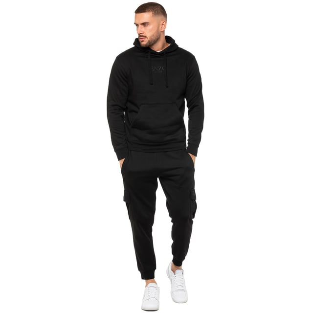 Enzo Mens Regular Fit Cargo Joggers. Features 2 Side Slash Pockets, 2 Cargo Pockets, Single Welt Back Pocket. Brushed Back Inner Fleece. Elasticated Waistband With Adjustable Drawstring. Cuffed Ankle. Features EZ Logo.