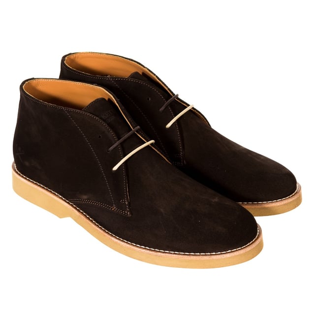 Booted shoe.
 Made of leather with a suede finish.
 Lace closure on the front.
 Leather insole customized by the brand.
 Flap with the brand name.
 Rubber sole.
 Cream stitching.
 Composition: Exterior: Leather; Interior: Leather,
 Care:
- Clean with a cloth dampened with water.
