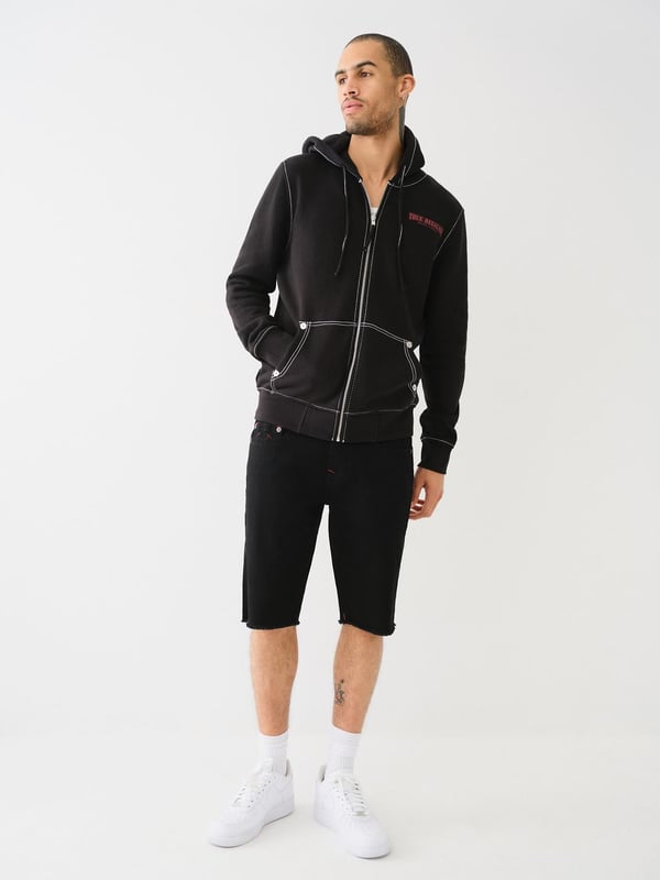 Stay warm in the on-trend Painted Horseshoe Zip Hoodie. This fleece hoodie features a zip-up front, drawstring hood, Big T stitching, long sleeves, and a split kangaroo pocket. Finished with a statement-making painted horseshoe graphic on the back. 