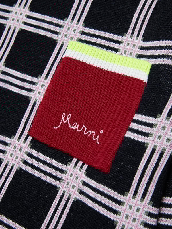 Introducing the Girls Sweater Dress in Black by Marni, your go-to piece for AW2024 sophistication and comfort. Impeccably tailored for the stylish young lady, here's why it's a wardrobe essential: Luxurious Comfort: Crafted with premium, soft materials for all-day ease.   Sleek Design: Features a chic, minimalistic aesthetic perfect for any occasion.   Versatile Black: A timeless colour that offers endless styling possibilities.Elevate her style with Marni's Sweater Dress in Black. Order today and experience fashion-forward elegance!