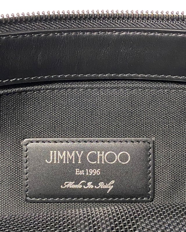 VINTAGE, RRP AS NEW
Made in Italy, this clutch bag by Jimmy Choo is crafted from black leather. Fit in your daily essentials with this bag that features a star and stripes design with interior pockets, finished with zip closure.

Jimmy Choo Derek Clutch Bag in Black Leather
Condition: very good
Color: black 
Material: Leather
Sign of wear: Yes
SKU: 94461