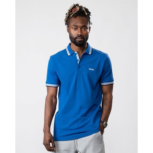 A signature polo shirt by BOSS Menswear, cut to a regular fit. Featuring contrast tipping and a logo at the left chest, this short-sleeved polo shirt is designed in cotton piqué and detailed with further BOSS branding at the undercollar.
Regular fit. Flat-knit collar. Number of buttons: 3. Short sleeves. Flat-knit cuffs. Standard length
100% Cotton
50469055
Model is 5"8 and wears size M