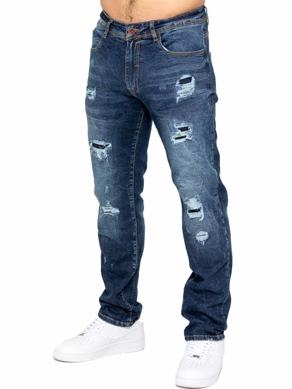 Upgrade your denim collection with Enzo Men's Distressed Ripped Jeans. Designed for the modern man, these jeans combine style and comfort with a classic straight leg cut and versatile 5-pocket design. The stretch fabric ensures a perfect fit and ease of movement. Featuring a zip fly fastening, distressed rip & repair detailing, and a branded back patch, these jeans add a rugged touch to any outfit. Ideal for casual outings or nights out, they effortlessly blend style and functionality.
