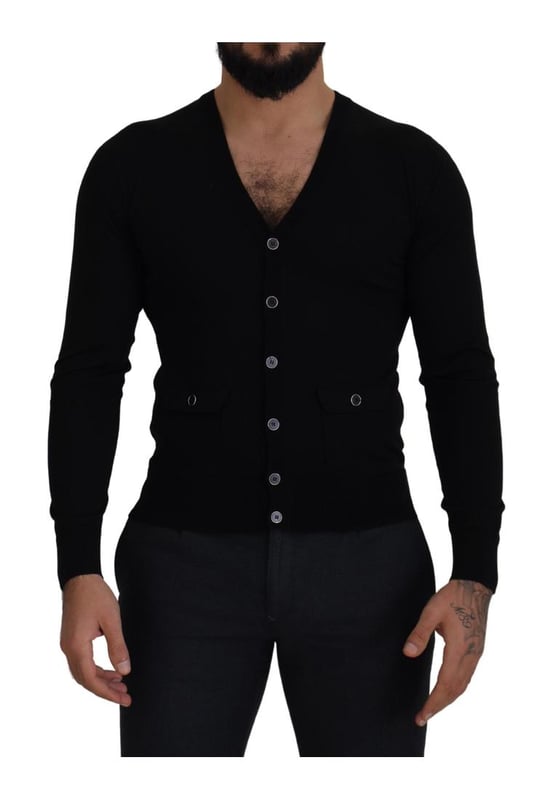 100% authentic Dolce & Gabbana cardigan sweater
  Crafted from Quality wool
  Classic black color
  Full button closure
  Logo details
  Made in Italy
  Material: 100% Virgin Wool