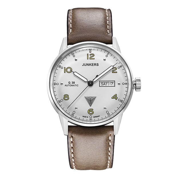 Manufacturer: POINT tec GmbH, Ismanning
A classic men's watch from the Junkers G38 series with a mechanical movement (Citizen/Miyota 8205, 21 jewels) with a weekday display.

General
Functions: Sweep second, date, day of the week
Model series: Junkers G38
silver
Special features: Green luminous dots, glass bottom
Water resistance: 10 atm
Housing
Glass: mineral glass
Case material: stainless steel
Housing color: silver
height and weight
Weight: 90g
Walking diameter: 42 mm
Case Height: 12mm
clockwork
Movement Type: Automatic
Movement caliber: Miyota 8205
Stones: 21
Half oscillations: 21600 h
Max. power reserve: 40 hours
Winding Direction: Bidirectional
dial
Dial Color: Silver
Fluorescent: hands, index
bracelet
Bridge width: 22 mm
Strap colour: Brown