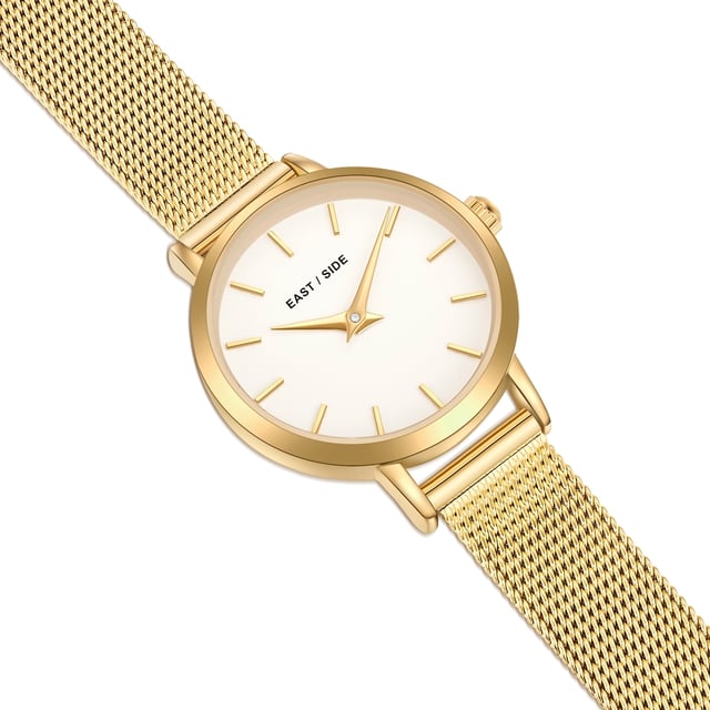 GENERAL INFORMATION:  • Targetgroup: Female  • Wristwatch: No Special Functions  • Display: analogue  • Weight of watch w/o box (gr.) - approx.: 24,0  MOVEMENT:  • Movement: Quartz  • Term of Movement: VC10  • Origin of movement: Japan  BRACELET:  • Material of bracelet/strap: Stainless steel  • Plating of bracelet/strap: Ion-Plating (IP)  • Finishing of bracelet/strap: Smooth  • Finishing/Decoration of bracelet/strap: None  • Clasp/Closure/Buckle: Slide Clasp  • Color of bracelet/strap: Yellowgold  • Length of bracelet/strap (mm) approx.: 190,0  • Width of bracelet/strap (mm) approx.: 9,5  • Style/Design of bracelet/strap: Mesh band (Millanaise Style)  • Bracelet/strap adjustable?: No  CASE:  • Shape of case: Round  • Size/Diameter of case in mm . approx.: 24,0  • Height of case in mm: 7,6  • Case material: Metal (Alloy)  • Surface of case: Polished  • Bezel/Topring: Fixed  • Finishing/Decoration of case: None  • Material of case back: Stainless steel  • Lock of case back: No screwed-in crown  • Color of case: Yellowgold  • Coating/Plating (Case): Ion-Plating (IP)  • Type/Form of crystal: Flat  • Material of crystal: Mineral crystal  • Water resistant (ATM): 3  DIAL:  • Size jewelry care cloth: Hour, Minute  • Indices: Line indices  • Material of dial: Brass  • Structure/pattern of dial: Flat  • Color of dial: White  PUSHER, CROWN, HAND:  • Pusher: None  • Corrector: No  • Crown: No screwed-in crown  • Type of hands: Dauphine hands  • Luminescent (hands): No  PACKAGING & SCOPE OF DELIVERY:  • Box: Yes  • Service booklet: Yes  • Manual: Yes