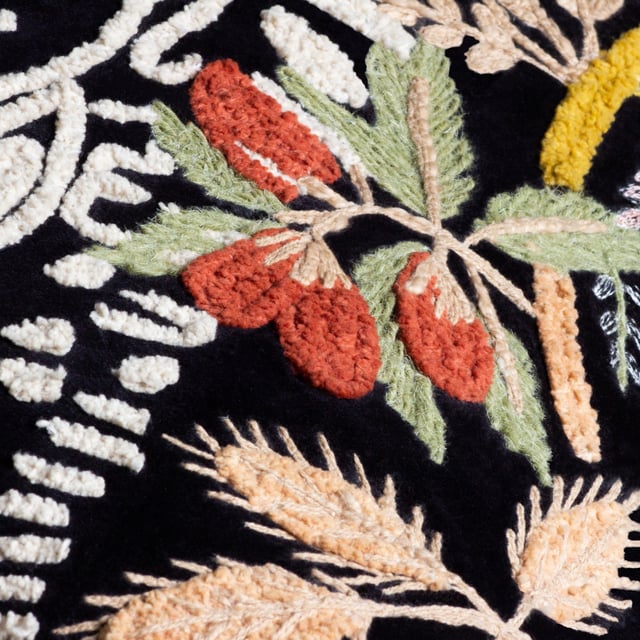An amazing mix of embellished embroidery, applique and tufted cotton define this clever design. The further away you view this cushion, the easier it is to see the depiction of an exotic zebra munching on the surrounding fruits of the jungle, which are also lovingly embroidered onto the design. This is all surrounded by a sumptuous cotton velvet background which further makes these intricate details stand out even more. An ideal way to create intrigue and add an exotic feel to your home. Size: 50 x 50cm