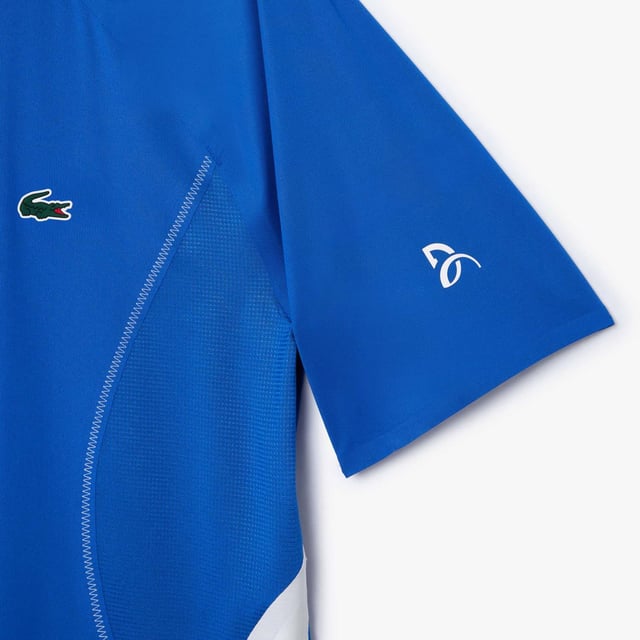 DH7311 Lacoste Tennis x Novak Djokovic Ultra-Dry Poloshirt Gerecycled polyester gemaakt van snijafval Normale pasvorm Recht model Lichtgewicht stretch jersey Getest door Novak Djokovic Siliconen krokodil op borst Lacoste Tennis x Novak Djokovic Ultra-Dry Poloshirt Gerecycled polyester gemaakt van snijafval Normale pasvorm Recht model Lichtgewicht stretch jersey Getest door Novak Djokovic Siliconen krokodil op borst