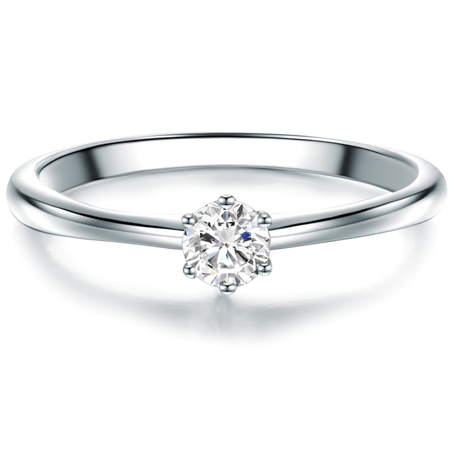 Hearts in the heart: This simple and exceptionally filigree engagement ring of the manufactory in 1934 optically relies on understatement and yet stands for great feelings. The narrow ring rail is decorated by a sparkling zirconia-solitary, very classic in a recording that makes the jewelry stone shine and at the same time offers a safe hold. Thanks to the brilliant cut with 57 facets, the zirconia looks deceptively similar to a real diamond - a wonderful engagement ring that accompanies her loved one for many years and wears both solo and cuts a good figure as a pretense ring.