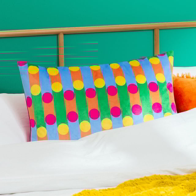 Dopamine Decor is an interior design and furniture collection designed to make you happy! Place this cushion on your sofa to make it stand out with its eye-catching design of retro circles and stripes in bright, trendy tones, which fuse together to produce an explosion of vibrant colour. The perfect way to inject some personality into your living space. Size: 40 x 60cm