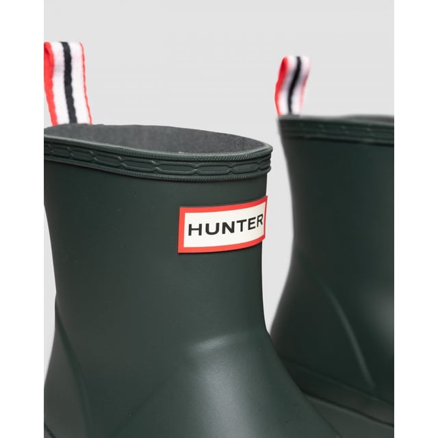 A new, versatile, lightweight, colourful and completely waterproof rain boot. Handcrafted from 10 individual parts, this new boot is a simplification of the Hunter Original design language, retaining the most iconic elements of the classic Original Tall Boot. Perfect for festivals, it has a pull tab at the heel for ease of foot entry.

Waterproof
Handcrafted from natural rubber
Lightweight
Hunter Original branding