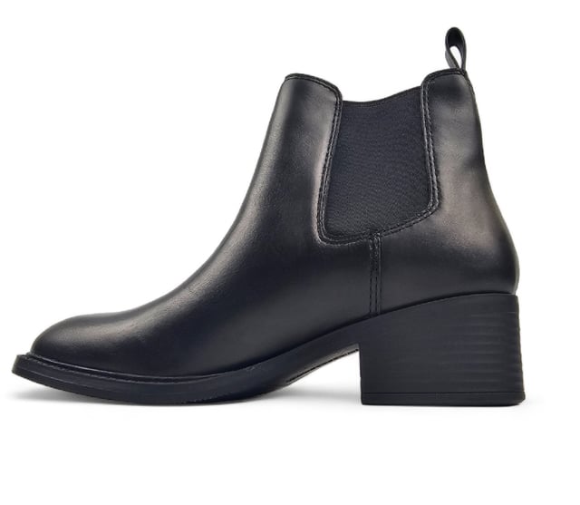 The Windsor Smith Replace boots are a stylish take on the classic Chelsea boot, featuring a sleek black leather upper and a timeless round toe design. With double woven elastic gussets and a leather pull tab, these boots provide easy on-and-off wear while maintaining a sophisticated look.

Sleek Leather Upper: Crafted from high-quality leather for a polished look.
Comfortable Non-Leather Lining: Soft lining enhances comfort for all-day wear.
Durable Non-Leather Sole: Provides reliable traction and stability.
Classic Round Toe: Timeless design that complements any outfit.
Elegant Chelsea Style: A chic addition to your footwear collection.
Moderate Heel Height: 50 mm heel offers a perfect blend of style and comfort.
Secure Fit: Features double woven elastic gussets for easy access and a snug fit.
Convenient Leather Pull Tab: Allows for quick and effortless on-and-off wear.Leather pull tab