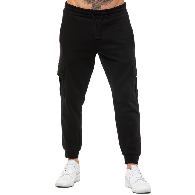 Enzo Mens Regular Fit Cargo Joggers. Features 2 Side Slash Pockets, 2 Cargo Pockets, Single Welt Back Pocket. Brushed Back Inner Fleece. Elasticated Waistband With Adjustable Drawstring. Cuffed Ankle. Features EZ Logo.