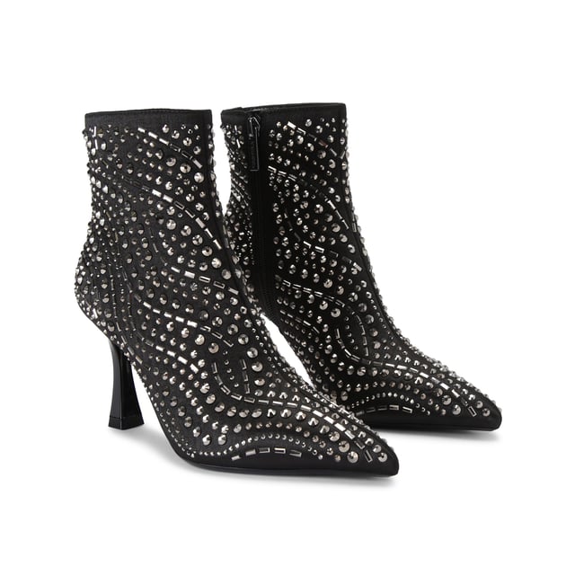 The Carvela Catwalk ankle boot features a black satin upper with gunmetal studs across the upper. The heel is in a flared design. Heel height: 8.5cm.