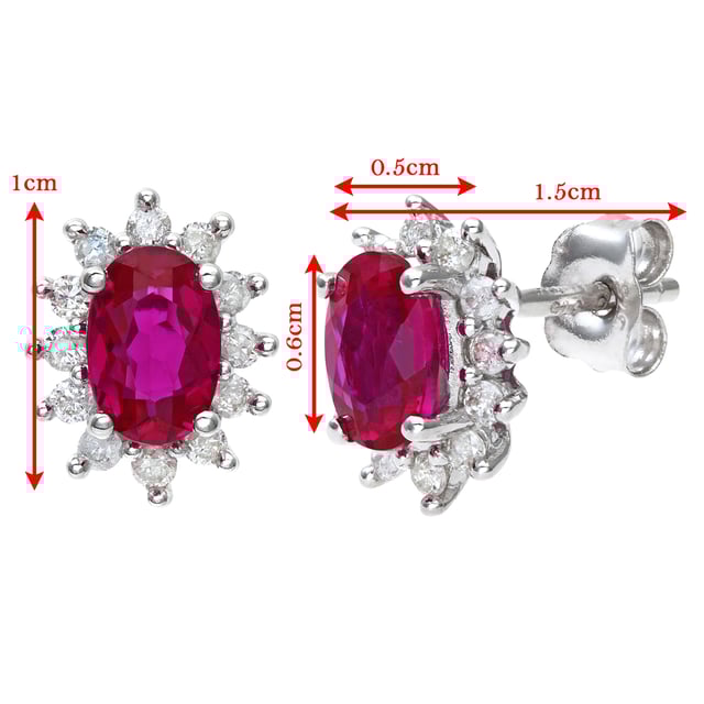 9K (375) witgoud: 1,32 gram; # Diamant: 0,25 ct; # Robijn: 1,21 ct; # Afmeting: 0,9 cm x 0,7 cm