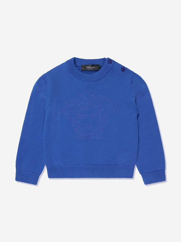 Versace's Italian portraits embody fine detailing and impeccable construction. This baby boys bright blue jumper captures the label's eccentric personality and passion for manipulating Greek abstracts into fashionable pieces. Made in pure virgin wool, it has been depicted with a subtle Medusa motif embroidery in the centre. Little ones will look effortlessly stylish and sophisticated.  Medusa Kids Embroidery Long Sleeves Shoulder Button Closure Elasticated Cuffs and Hem Outer Composition: 100% Pure Virgin Wool Embroidery: 100% Viscose Hand Wash Gently Using Mild Detergent Do Not Bleach Do Not Tumble Dry Dry Flat Cool Iron On Reverse With Damp Cloth On Top Do Not Dry Clean Wash Inside Out Do Not SoakVersace Size : Child's Height 0/3M: 22" / 56 cm 3/6M: 24.5" / 62 cm 6/9M: 27" / 68 cm 9/12M: 29" / 74 cm 12/18M: 31.5" / 80 cm 18/24M: 34" / 86 cm 2A: 36" / 92 cm 3A: 38.5" / 98 cm