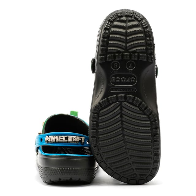 Minecraft-inspired clogs featuring 3D block Jibbitz™ charms for a playful, game-themed design. Crafted with a soft, flexible upper and ventilation holes for enhanced breathability, keeping feet cool.