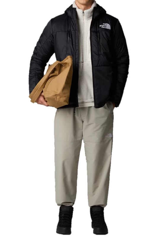 Inspired by a true The North Face icon, the Limbara Light Synthetic Jacket borrows a classic mountain design to keep you warm wherever you explore. - - . Its light and lofty THERMOLITE insulation is just what’s needed when you’re out and about on chilly days. - -.  The Jacket Comes with - -. There's a hood, too, in case of light showers or snow flurries. - - . Centre front zip, Interior zipped pocket. - - . Two chest zip pockets and two hand zip pockets behind the welt. - -. Tricot chin guard. - - . Elasticated binding at hood and cuffs. - - . Embroidered logos Even better, it's made from recycled materials, helping to keep discarded plastic out of landfills.