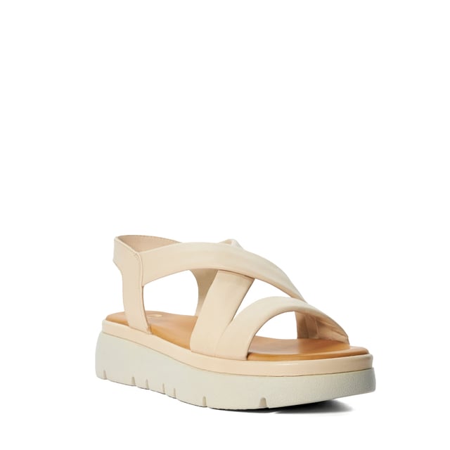 Dune Ladies Lounge - Chunky Leather Sandals Slide into our effortlessly stylish Lounge sandals. The leather straps cross over the front of the foot, and we love the directional look of the trend-led tractor sole. Complete with a square toe the contrasting leather sole is ultra-smooth and features our bespoke Dune London logo, making this style a covetable choice for any woman's summer sandal collection.