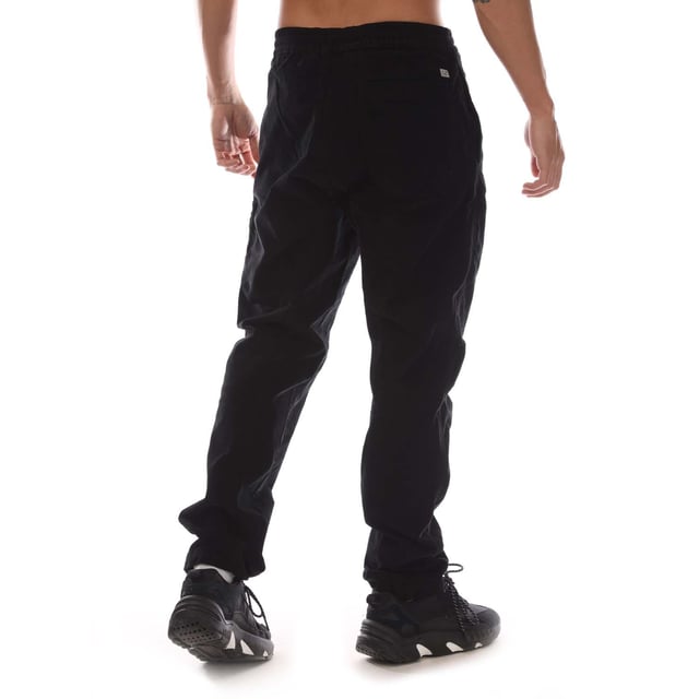 Mens C.P. Company Corduroy Lens Pants in black.- Adjustable drawstring at inner waistband.- Zip fly and button fastening.- Side welt pockets.- Rear patch pocket.- Cargo zip pocket with Lens detail.- Old dyed.- Regular fit.- 97% Cotton  3% Elastane.  Machine washable.- Ref: 17CMPA123A 006410O 999