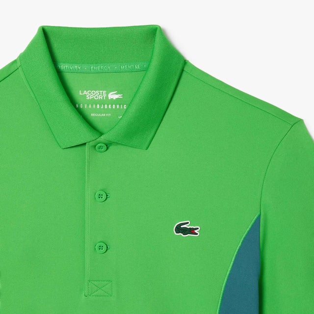 Lacoste Tennis x Novak Djokovic Ultra-Dry Polo Shirt.- Recycled polyester made from manufacturing offcuts.- Regular fit, straight cut.- Contrast sides.- Tested by tennis players.- Silicone crocodile on chest. Material: 100% Polyester. Ref: DH7330IXU.