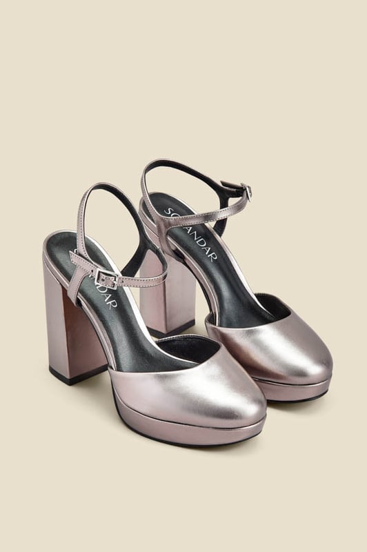Platforms are back
You won't believe how comfy they are
Luxe metallic leather - they're made for dancing
Closed toe means no pedi needed
Style with a silky blouse and flared jeans
Pair with a dress for weddings and parties